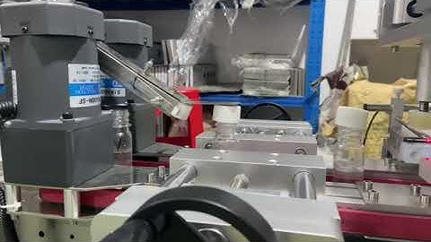 Dây chuyền chiết rót siết nắp mini/ Máy cấp nắp/ Máy siết nắp/ Máy chiết nhớt tự động - Propack