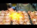 Fire grandly! Takoyaki using a whole octopus in Okinawa, Japan.Japanese Street Food.