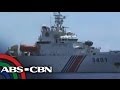 Philippine ship plays cat-and-mouse with Chinese vessels