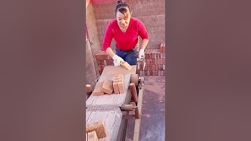 Unloading and stacking process of red bricks transported by conveyor belt