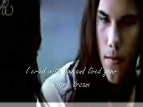 i dont own anything! no copyright infringement intended. its juss a vid (kinda cheesy) about jake and bells. HOLLA! song="my eyes adore you"- justin young ( i think) description: edward tries to tell bella that jacob loves her..but she doesnt believe that its true. Then bella recieves a letter from jacob, spilling all his true feelings. (the words of his letter are being sung in the background of the vid and are the cursive writing.) bella reflects on all the times jacob and her were together, and realizes how long hes loved her. in the end she'll have to choose whether her eyes adore jacob too or if she shuld stay with her overprotective boyfriend.