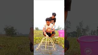 Fishing,Two expert,a, fishing together in the field canal using,hooks l hook fishing,