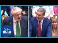 Boris Johnson and Keir Starmer tear into each other after no confidence vote | PMQs