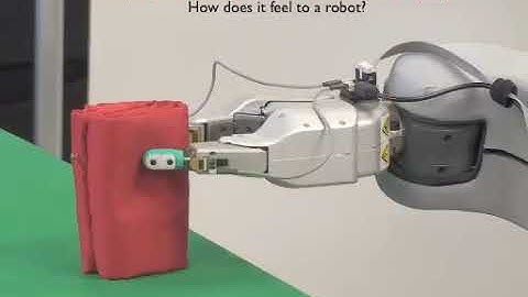 Using Robotic Exploratory Procedures to Learn the Meaning of Haptic Adjectives