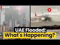 Dubai rain airport flooded roads shut as heavy rains wreak havoc in dubai