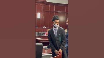 Jacksonville rapper Kshordy waves to family Friday after Duval jury finds him guilty in gun case.