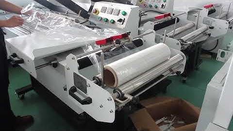how to loading the film of  semi-auto L bar sealing shrink wrapping machine