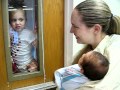 Big sister Paige meets her little brother Hunter for the first time