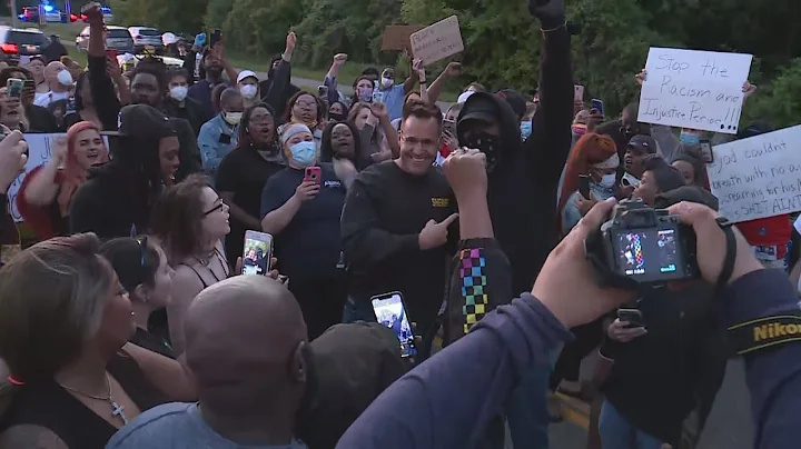 Genesee County Sheriff Chris Swanson joins protest...