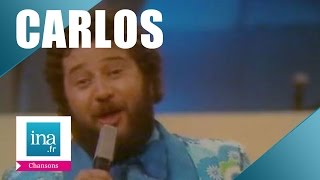 Carlos "Tout nu et tout bronzé" (live officiel) | Archive INA chords