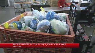 Sacred Heart Community Service giving away thousands of holiday meals to families in need.