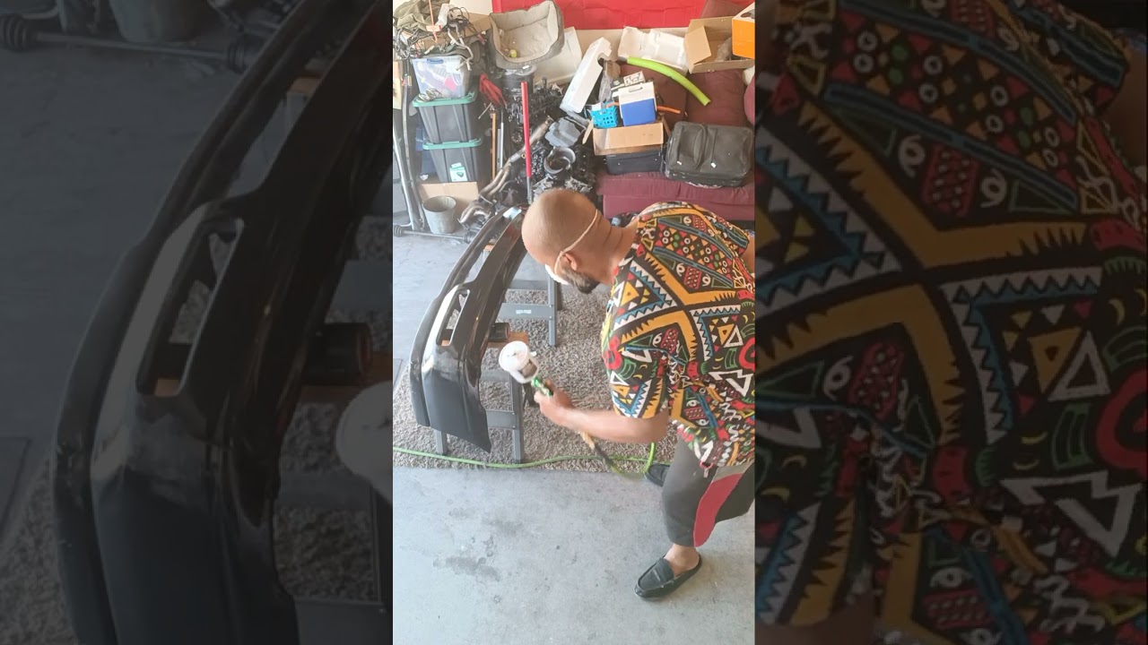 painting my front bumper with flat black rustoleum and a harbor freight gun!!!!