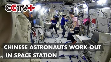 Chinese Astronauts Work Out in Space Station