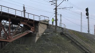 Продолжение строительства железнодорожного моста.