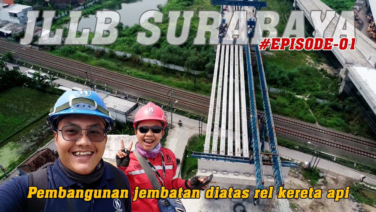 Membentang diatas rel kereta api. Pembangunan Jalan Luar Lingkar Barat Surabaya. 