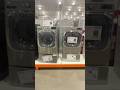 LG front load washer and electric dryer grey