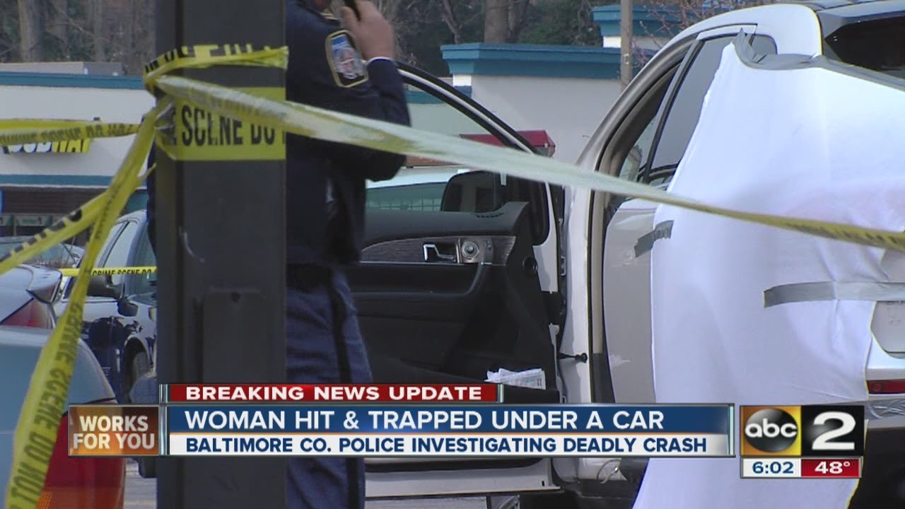 Woman dead after being struck by car in parking lot - YouTube
