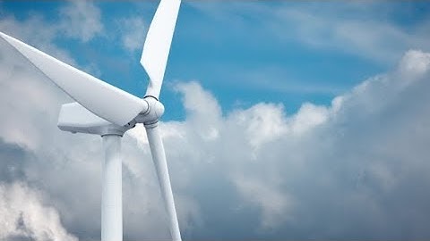 Beautiful White Windmill on Blue Sky Background | Stock Footage