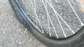 Riding my old bicycle with a flat tire