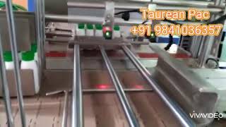 Auto collation & shrink wrapping machine for small plastic jars