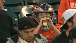 7/10/15: a young boy sports catcher's gear as he watches the giants
take on phillies at at&t park check out http://m.mlb.com/video for our
full archive o...