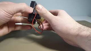 DRAFT Battery Mounted Caged Spinning Top Not Turning Rotor