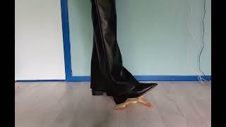 Bread trample and crush in ankle boots and leather pants