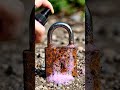 Padlock cleaning with spray