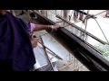 Assamese weaver in feet loom ( weaving endi) Assam Silk