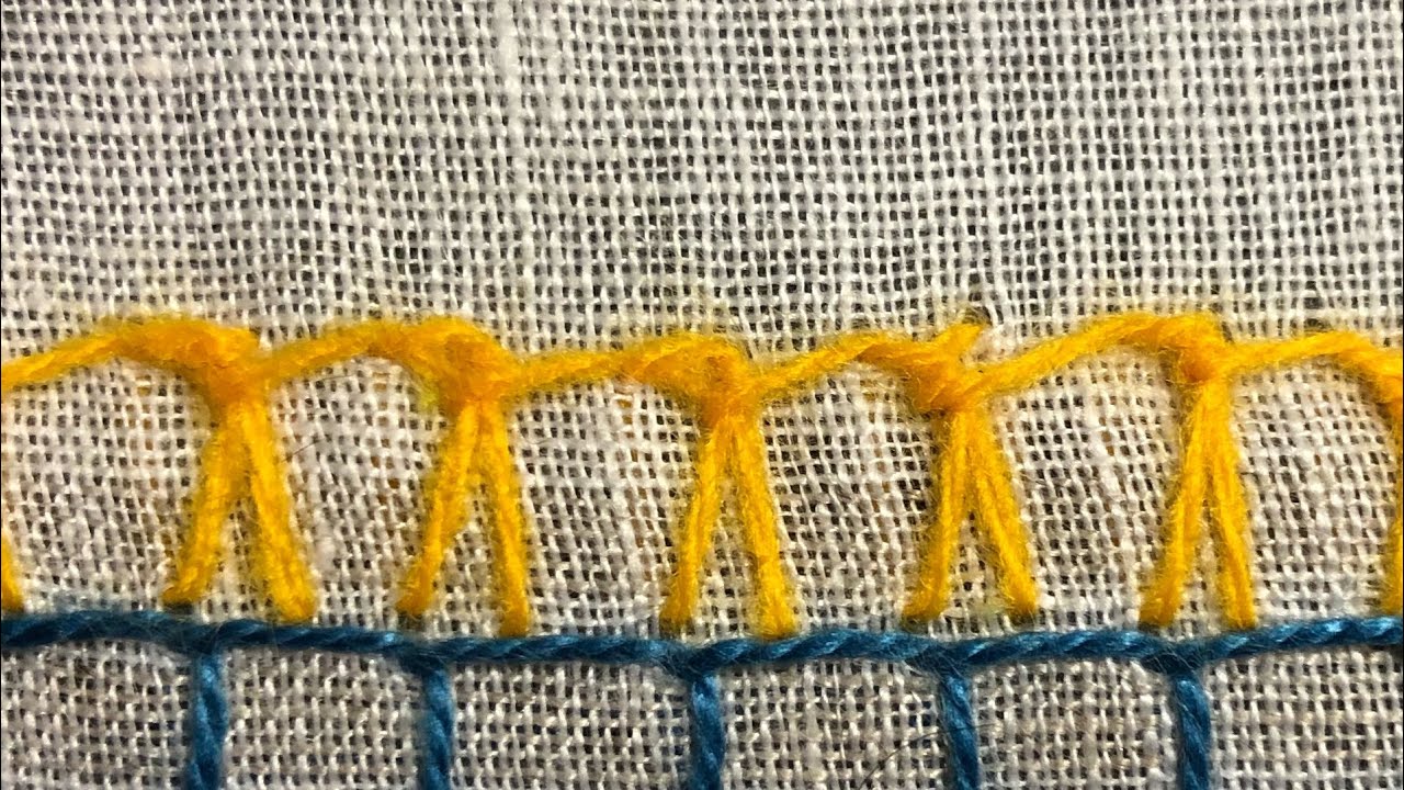 17. German knotted and whipped blanket stitch stitch along fabric dictionary of stitches