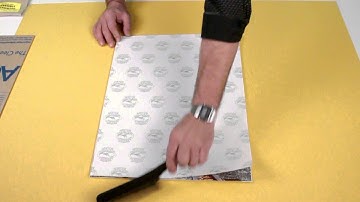 How to Attach Photographs and Artwork to Self Adhesive Board