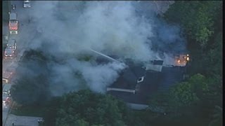 LIVE - Four found dead in US tennis star's burned Florida home