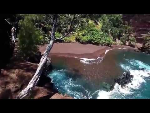 Hiking to the Red Sand Beach. Hana, Maui