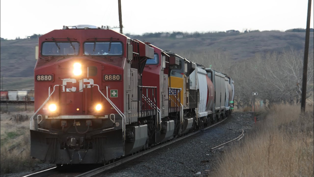 UP SD70AH!!! CP 8880, CP 8016, and UP 8988 Lead CP 400 Into Calgary, Alberta!
