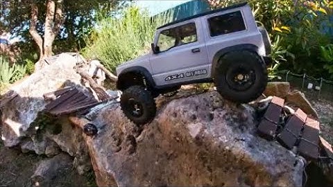 SCX24 Suzuki Jimny offroad scale park. Tires Super Swamper