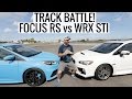 TRACK BATTLE! Ford Focus RS vs Subaru WRX STI
