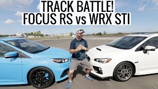 TRACK BATTLE! Ford Focus RS vs Subaru WRX STI