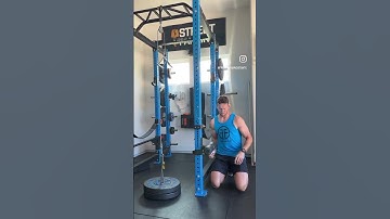 Lat pull-down knee support pad - power rack attachment