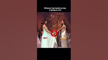 Thumbnail of who ever has hand on the top going to win👑 #missuniverse #shorts