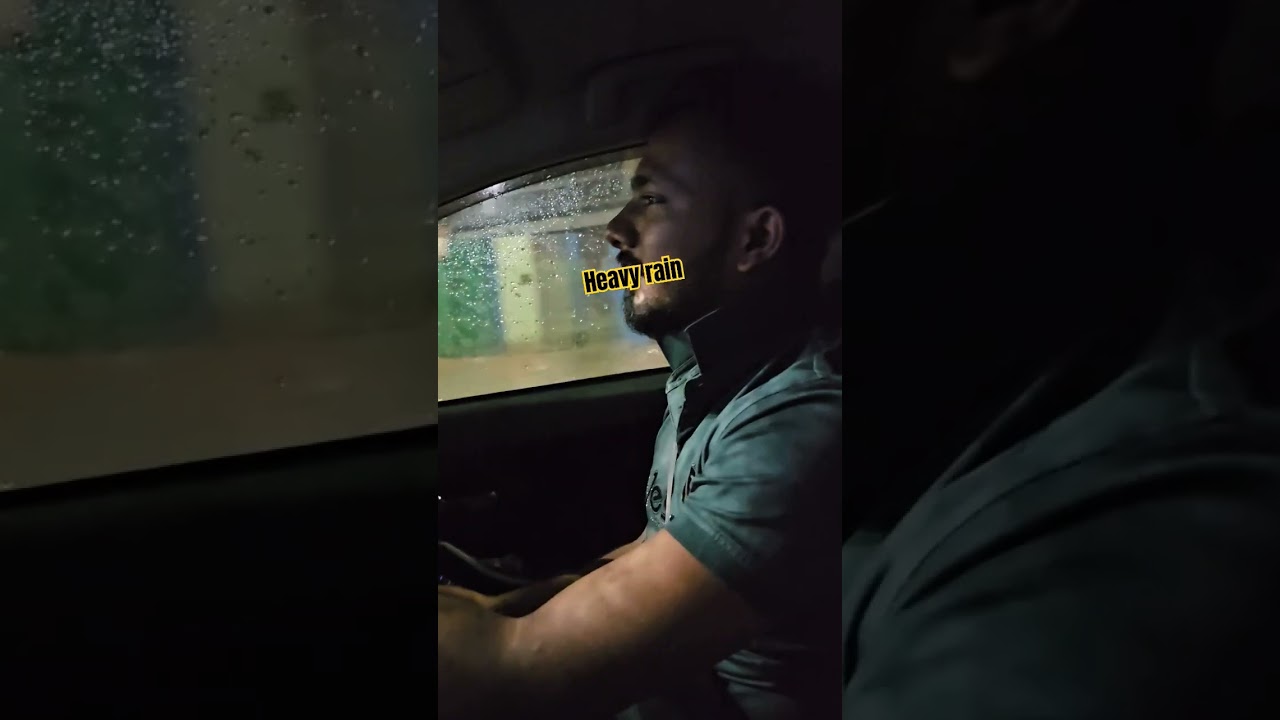 Driving in heavy rain with zero visibility 