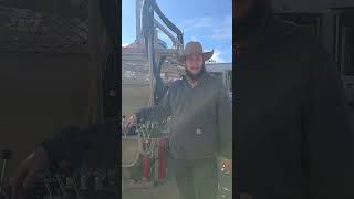 Swing arm controls on a Brute Stealth Hydraulic chute