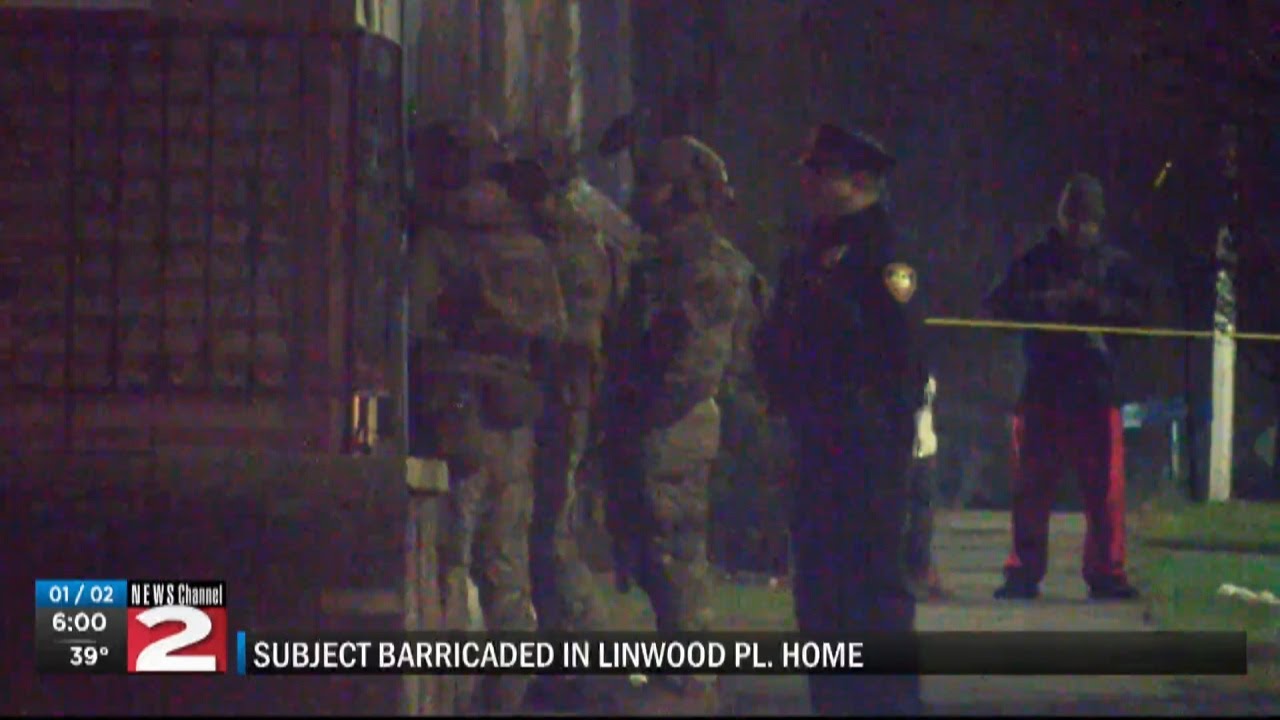Man barricaded inside home on Linwood Place - YouTube