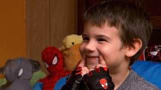 After losing parents, 6-year-old boy seeks smiles