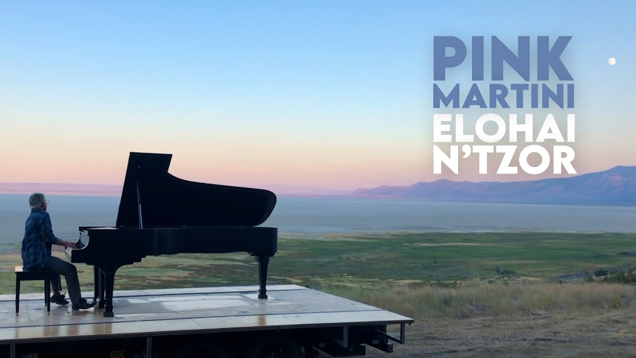 Filmed during during isolation in 2020, this project had to be set aside while other projects needed our limited time and attention. Featuring China Forbes, Ari Shapiro, and Ida Rae Cahana as vocalists, each musician was tasked with recording their video and audio in natural spaces they could reach. This stunning video is the result and we hope it brings you a little joy today.

LINEUP: 

Thomas M. Lauderdale, piano and bandleader
China Forbes, vocals
Ari Shapiro, vocals
Canto Ida Rae Cahana, vocals

LYRICS:

Elohai N’tzor L’shoni M’ra
U’sfatai Midaber Mirma
V’limkalelai Nafshi Tidom
V’nafshi K’afar Lakol Tihiyeh 

P’tach Libi B’toratech

N’tzor L’shoni M’ra 
U’sfatai Midaber Mirma 
V’limkalelai Nafshi Tidom 
V’nafshi K’afar Lakol Tihiyeh 

Elohai, Yihiyu L’ratzon Imrei Fee 
V’hegyon Libee L’fanecha 
Adonai Tzuri V’goali

ENGLISH TRANSLATION: 

O God, guard my tongue from evil 
And my lips from speaking falsehoods 
And to those who curse me - may my soul be silent 
And my soul shall be as dust, as earth before and for everyone 

O God, open my heart to Your Torah 

May the words of my mouth and the meditations of my heart 
Be acceptable before You, My God, my Rock and my Redeemer

FIND PINK MARTINI ONLINE: 
Official Website: http://pinkmartini.com/
Instagram: https://www.instagram.com/pinkmartini/ 
Facebook: https://www.facebook.com/pinkmartini
TikTok: https://www.tiktok.com/@pinkmartiniofficial
Spotify: https://bit.ly/spotifyPM  
Apple Music: https://bit.ly/pinkMartini
SoundCloud: https://soundcloud.com/heinzrecords
bandcamp: https://pinkmartini.bandcamp.com/ 
Pink Martini Fan Club: https://www.patreon.com/pinkmartini
The Official Pink Martini Store: http://store.pinkmartini.com/


#pinkmartini #thomaslauderdale #elohaintzor #chinaforbes #arishapiro #cantor #idaraecahana