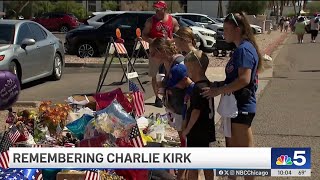 Mourners gather outside Turning Point USA headquarters ahead of Charlie Kirk