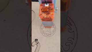 Grabado y corte láser (esferas navideñas) Compucel.