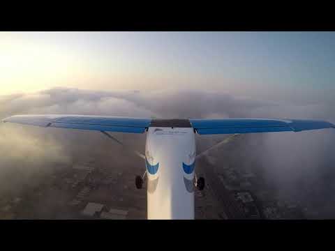 fixed wing aircraft Allegro light sport fly over clouds