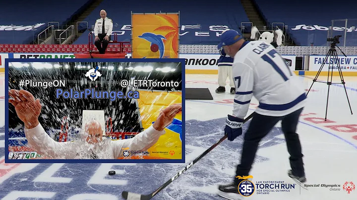 @TorontoPolice Chief Ramer takes the POLAR PLUNGE with help from Maple Leaf Legend Wendel Clark