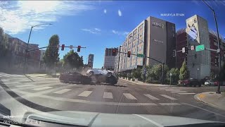 WATCH: Sunday afternoon rollover crash caught on camera in downtown Boise