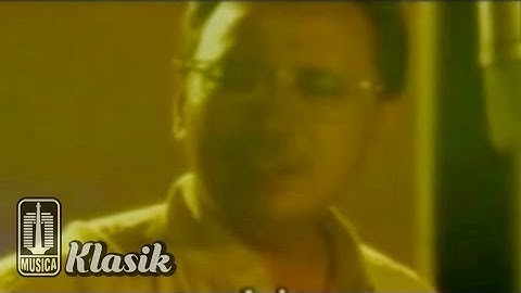 Ebiet G. Ade - Cintaku Kandas Direrumputan (Official Karaoke Video)